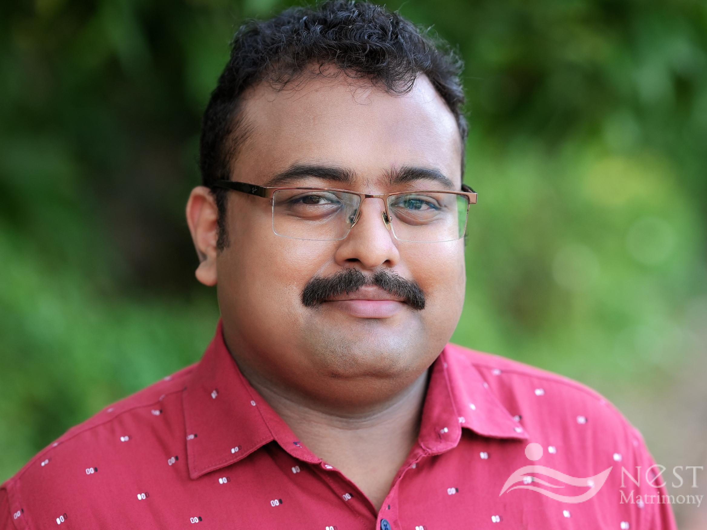 Nidhin